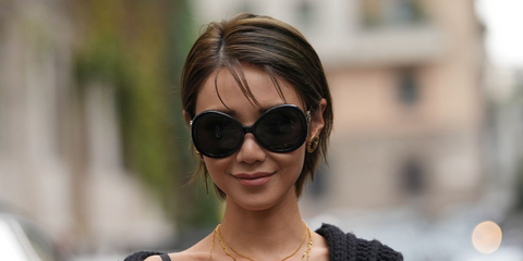 Hong Kong actress Elva Ni was seen wearing black Dolce&Gabbana DG6194U 501/87 round butterfly sunglasses at the Dolce & Gabbana Spring/Summer 2026 fashion show during Milan Fashion Week. Shop online now on Pretavoir