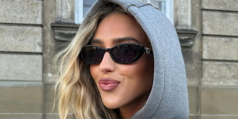Danish fashion stylist and creative consultant Emili Sindlev was seen wearing black Gucci GG1680S 002 cat eye sunglasses with crystal studded G details in her Instagram post, January 2025. Shop online now on Pretavoir