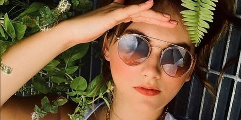 Emilia Jones was seen wearing pink Ray-Ban RB 3647N 9069/A5 round sunglasses