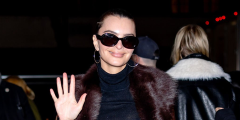 Emily Ratajkowski was seen wearing dark tortoiseshell Gucci GG1587S 002 oval sunglasses with brown lenses at the Tory Burch Fall/Winter 2026 fashion show during New York Fashion Week.