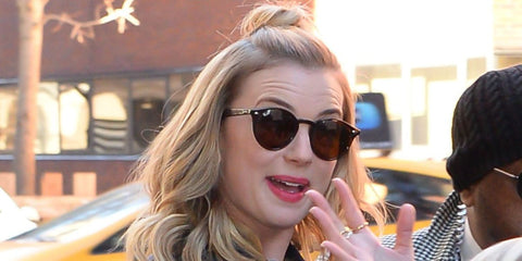 Canadian actress Emily VanCamp was seen wearing tortoiseshell Ray-Ban 2180 710/73 Round sunglasses with brown lenses in New York City, January 2018.