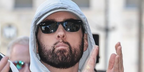 Eminem was seen wearing black Ray-Ban New Wayfarer RB 2132 901L sunglasses to attend the Hollywood Walk of Fame Star Ceremony for Dr. Dre in California, March 2024