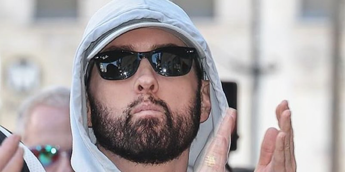 Eminem was seen wearing black Ray-Ban New Wayfarer RB 2132 901L sunglasses to attend the Hollywood Walk of Fame Star Ceremony for Dr. Dre in California, March 2024