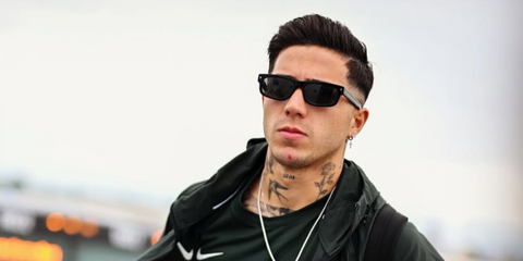 Argentine footballer Enzo Fernandez was seen wearing black Prada PR B11S 16K731 sunglasses in his Instagram post, June 20255.