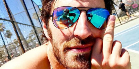 Irish actor Eoin Macken was seen wearing blackRay-Ban Aviator Large Metal RB 3025 002/4O sunglasses in a social media post.