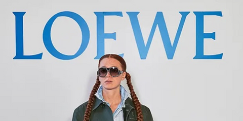 Actress Erin Kellyman was seen wearing black and grey Loewe Anagram LW40194I 01T sunglasses with bordeaux gradient lenses at the Loewe Spring/Summer 2026 fashion show during Paris Fashion Week.