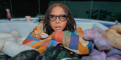 Singer and cultural icon Erykah Badu was seen wearing Ray-Ban Meta Headliner RW4009 601S/M3 Photochromic Smart Glasses in the Ray-Ban Meta campaign
