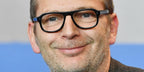 French director and producer Etienne Comar was seen wearing Cutler and Gross 0822 Black optical glasses