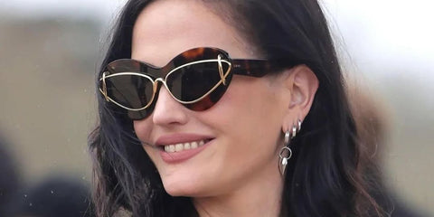 Eva Green is seen wearing Loewe Double Frame LW40119I 01A sunglasses to the brand's Fall/Winter 2024 fashion show in Paris