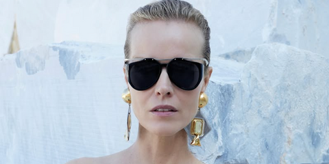 Eva Herzigova is seen modeling Saint Laurent SL M137/F Amelia 001 sunglasses in the brand's Spring/Summer 2024 campaign