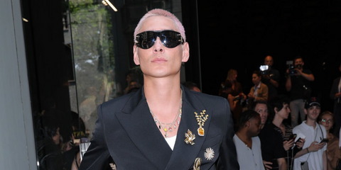 Evan Mock was seen wearing black Dolce&Gabbana DG4499 501/87 shield sunglasses at the Dolce & Gabbana Spring/Summer 2026 fashion show during Milan Men's Fashion Week