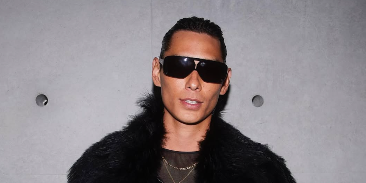 Evan Mock wears Saint Laurent Sun SL 569 Y 001  sunglasses at the brand's menswear Fall/Winter 2023 fashion show in Paris