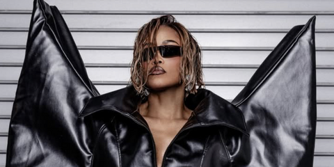 Singer and rapper Eve was seen wearing black Balenciaga BB0041S 001 Mono Rectangle sunglasses in a Numero Netherlands magazine feature, February 2026.