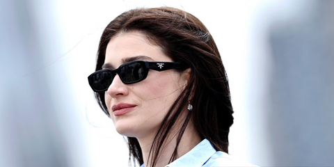 Eve Hewson was seen wearing black Prada PR B06S 16K08Z sunglasses at the London photocall of "Disclosure Day", June 2026.