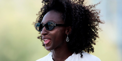 French actress Eye Haidara was seen wearing black Saint Laurent Sun SL M136 001 oval sunglasses at the 73rd San Sebastian International Film Festival.