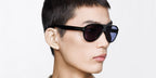 Male model wears Tom Ford TF1336 01V black sunglasses