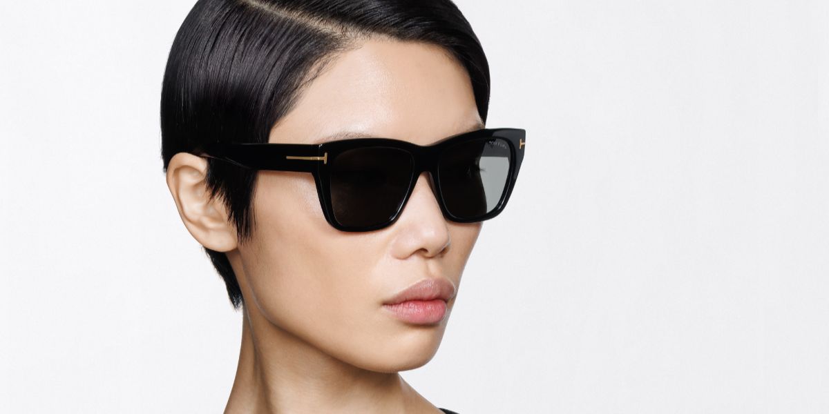 Female model wears Tom Ford TF1343 01D black cat eye sunglasses