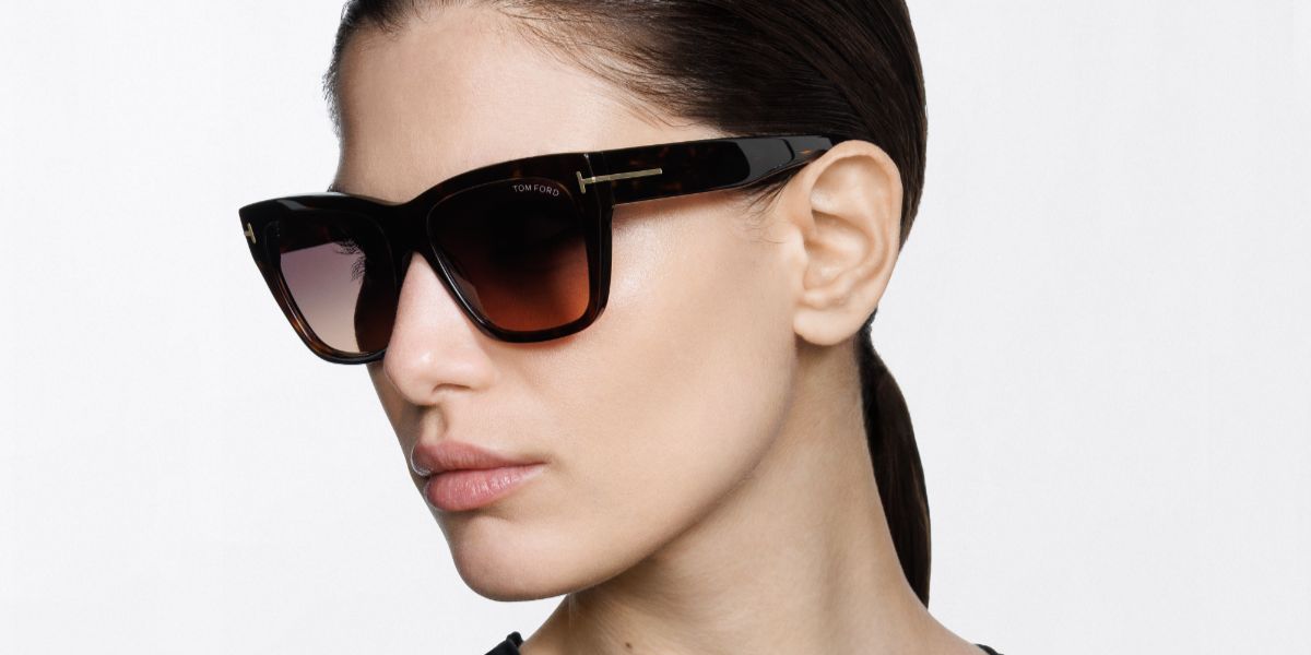 Female model wears Tom Ford TF1343 52T brown cat eye sunglasses