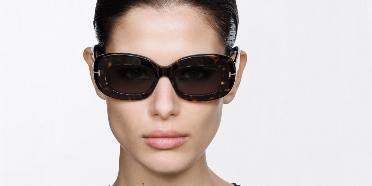Female model wears Tom Ford TF1345 52E brown havana sunglasses