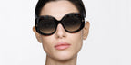 Female model wears Tom Ford TF1346 52B dark havana sunglasses