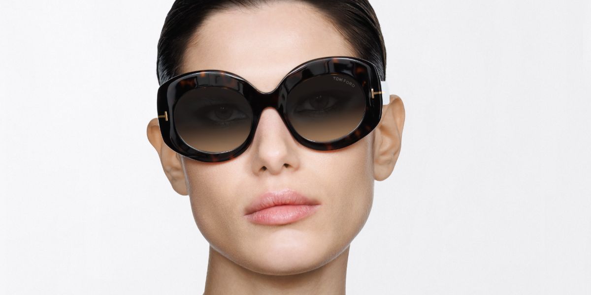 Female model wears Tom Ford TF1346 52B dark havana sunglasses