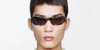 Male model wears Tom Ford Addison-02 TF1400 56A honey havana wraparound sunglasses