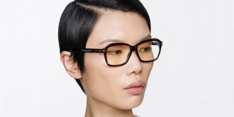 Female model wears Tom Ford TF6129-B 052 Blue Control havana glasses