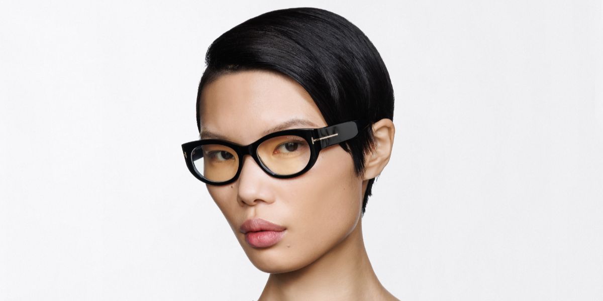Female model wears Tom Ford TF6133 B 001 Blue Control black glasses