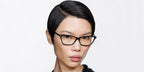 Female model wears Tom Ford TF6135 B 001 Blue Control black cat eye glasses