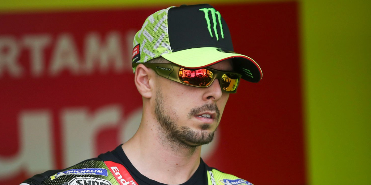 Italian motorcycle racer Fabio Di Giannantonio was seen wearing matte black Oakley Permian OO9520 07 sunglasses with Prism road red mirror lenses at the MotoGP of Italy, May 2026.