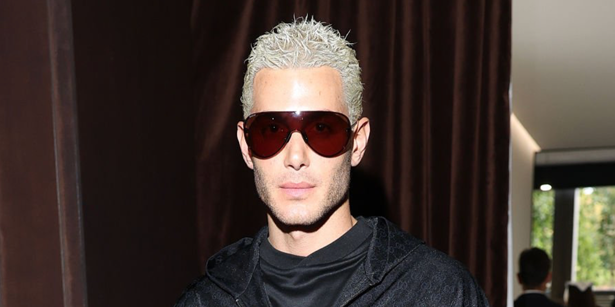 Fai Khadra wore brown Gucci GG2271S 006 shield sunglasses at the Gucci Spring/Summer 2027 show during Milan Fashion Week.