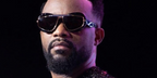 Fally Ipupa was seen wearing black and gold Loewe Double Frame LW40120I 01A sunglasses in his promotional image in 2024