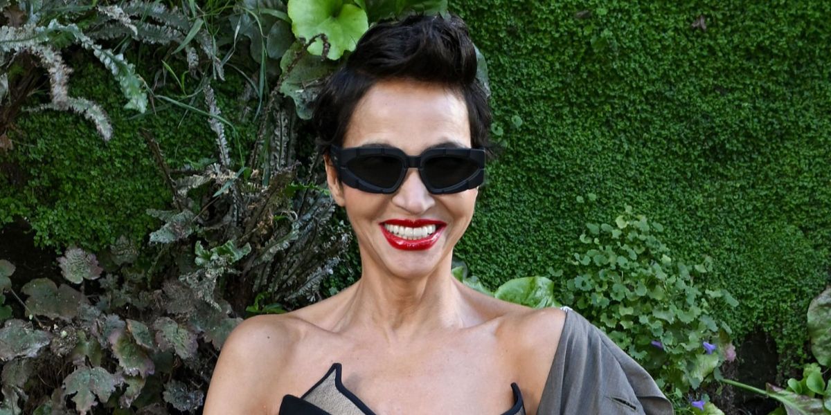 Algerian-French model Farida Khelfa was seen wearing black Balmain B Spirit BPS-179A sunglasses at the Jean Paul Gaultier Spring/Summer 2026 fashion show during Paris Fashion Week.
