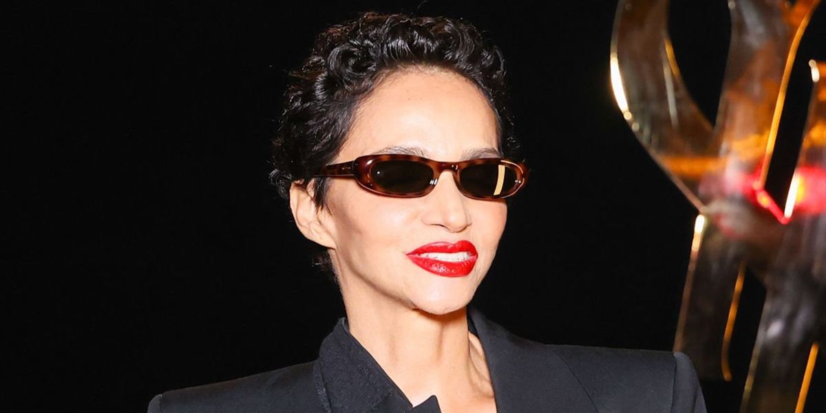 French-Algerian actress Farida Khelfa wore tortoise Saint Laurent SL 557 SHADE Plump 002 sunglasses at the Saint Laurent Spring Summer 2027 show during Paris Fashion Week.