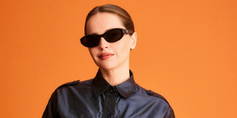 Felicity Jones was seen wearing black Prada PR 26ZS 16K08Z sunglasses at the Prada Spring/Summer 2026 fashion show during Milan Fashion Week. Shop online now on Pretavoir