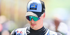 Spanish Fermin Aldeguer was seen wearing polished white Oakley Sutro Lite Sweep OO9465 04 sunglasses with Prizm road jade lenses at the MotoGP of Italy, May 2026.