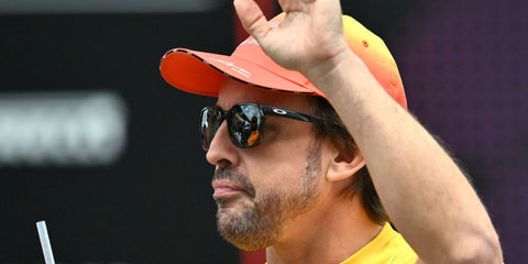 Fernando Alonso wears Oakley Ojector OO9018 04 Prizm Polarised Sunglasses at the F1 Spanish Grand Prix 2024