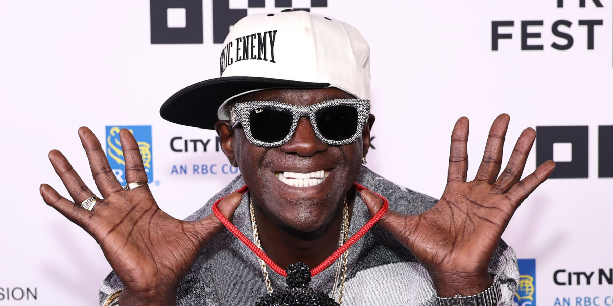 Rapper Flavor Flav was seen wearing black Ray-Ban Wayfarer Puffer Crystal Pavè Edition RB 4940BP 6865/87 sunglasses at the "Earth, Wind & Fire" Opening Night Premiere during Tribeca Film Festival 2026