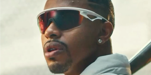 Baseball player Francisco Lindor was seen wearing Oakley Sphaera OO9403 11 Prizm sunglasses in a social media campaign, February 2024. Shop online now on Pretavoir