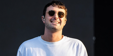 Record producer Fred again.. was seen wearing gold Ray-Ban Hexagonal RB 3548N 001/57 sunglasses with brown Polarised lenses