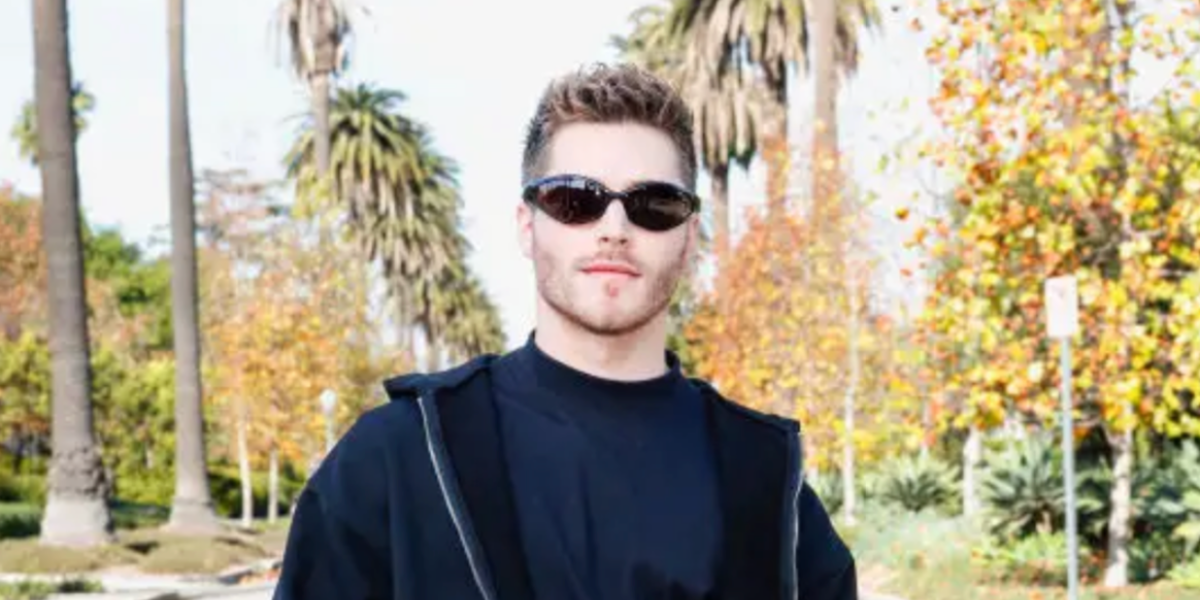 Froy Gutierrez was seen wearing black Balenciaga BB0285S 001 shield sunglasses to attend the Balenciaga Fall 2024 fashion show in Los Angeles