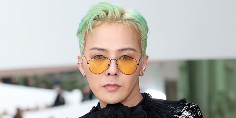 G-Dragon was seen wearing Ray-Ban Aviator Large Metal RB 3025 004/R6 sunglasses with yellow lenses at CHANEL Spring/Summer 2025 couture show