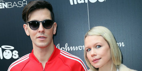 Cobra Starship frontman Gabe Saporta, pictured with wife Erin Fetherston, was seen wearing rubber black Ray-Ban Erika 4171 6228G round sunglasses at the GOOD+ Foundation's 1st Annual Halloween Bash in Hollywood