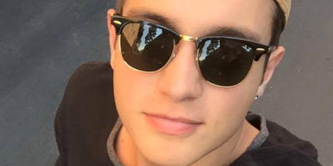 Content creator Gabriel Conte was seen wearing the iconic Ray-Ban Clubmaster 3016 W0365 Black half-rim sunglasses