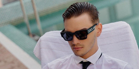 French-Spanish actor Gabriel Guevara was seen wearing black Dolce&Gabbana DG6184 501/87 square sunglasses in a Folie Magazine feature, September 2023