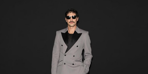 Gabriel Leone wears Dolce&Gabbana DG6185 501/87 sunglasses to the brand's menswear Spring/Summer 2025 fashion show in Milan, Italy