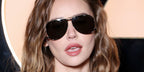 Australian model Gabriella Brooks was seen wearing silver Saint Laurent Sun SL 690 Dust 002 aviator sunglasses at the Saint Laurent Fall/Winter 2024 fashion show during Paris Fashion Week.