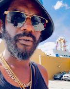Guitarist, singer, and songwriter Gary Clark Jr. was seen wearing gold Cartier CT0385S 001 sunglasses in his Instagram post