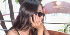 K-Pop idol Gawon of the girl group MEOVV was seen wearing black Prada PR B15S 16K731 sunglasses in a social media post, July 2025.