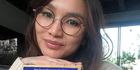 Gemma Chan wears Projekt Produkt FS18-S C8PG optical glasses while reading book in her free time